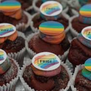 Rainbow cupcakes with 'pride' toppers