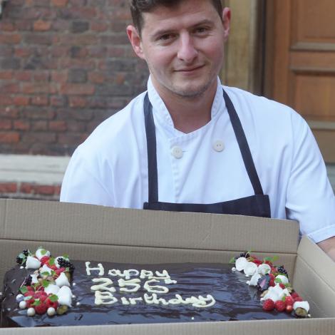 Alan Smith, head chef at St Catharine's College, with the 256th anniversary cake for Addenbrooke's Hospital