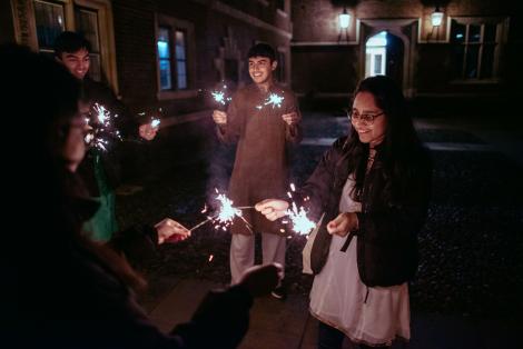 St Catharine's students with sparklers for Diwali