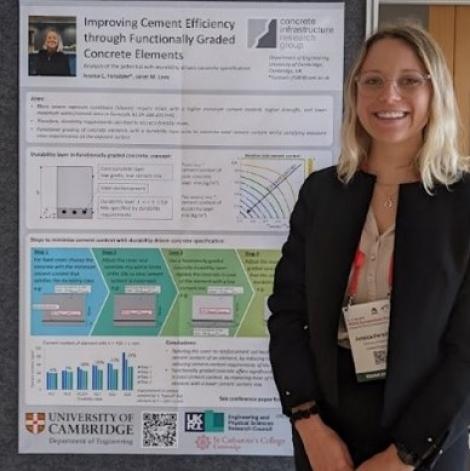 Jess Forsdyke with scientific poster on 'Improving Cement Efficiency through Functionally Graded Concrete Elements
