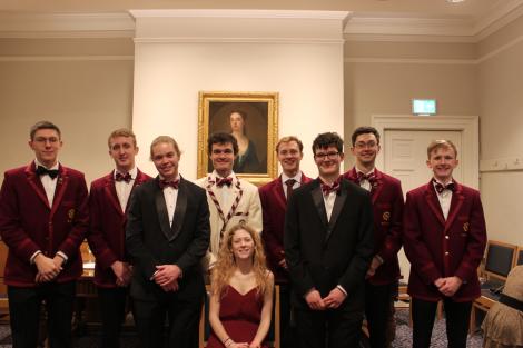 St Catharine's M1 crew from Lent Bumps 2024 at the boat club dinner
