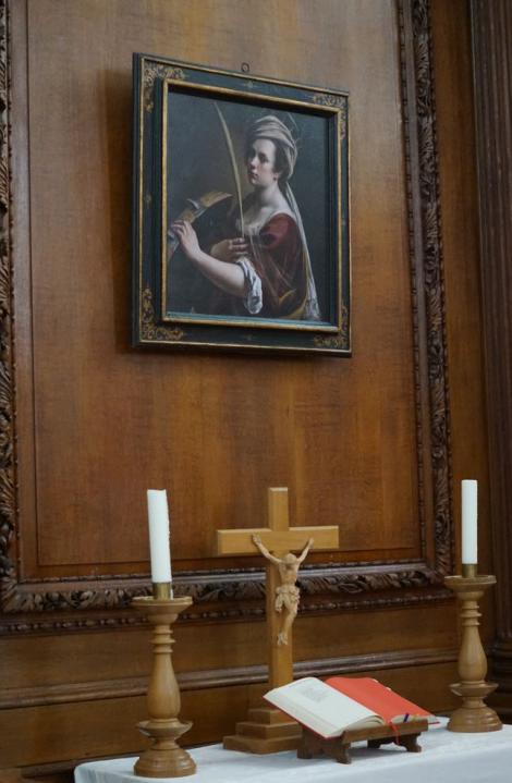 Reproduction of Artemisia Gentileschi's Self Portrait as Saint Catherine of Alexandria above the altar in the Chapel at St Catharine's College