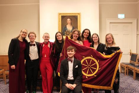 St Catharine's W1 crew for Lent Bumps 2024 at the boat club dinner