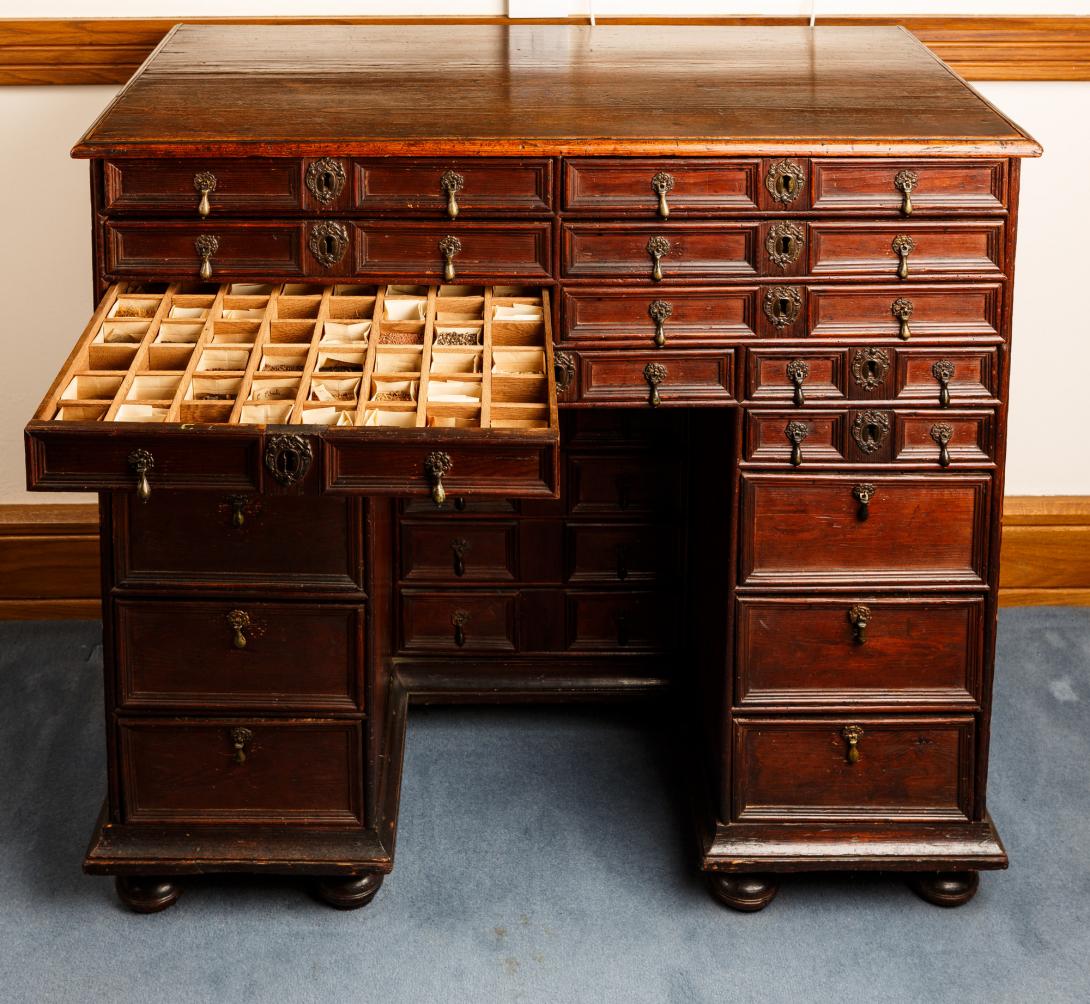 Wooden chest owned by St Catharine's alumnus John Addenbrooke with one drawer open